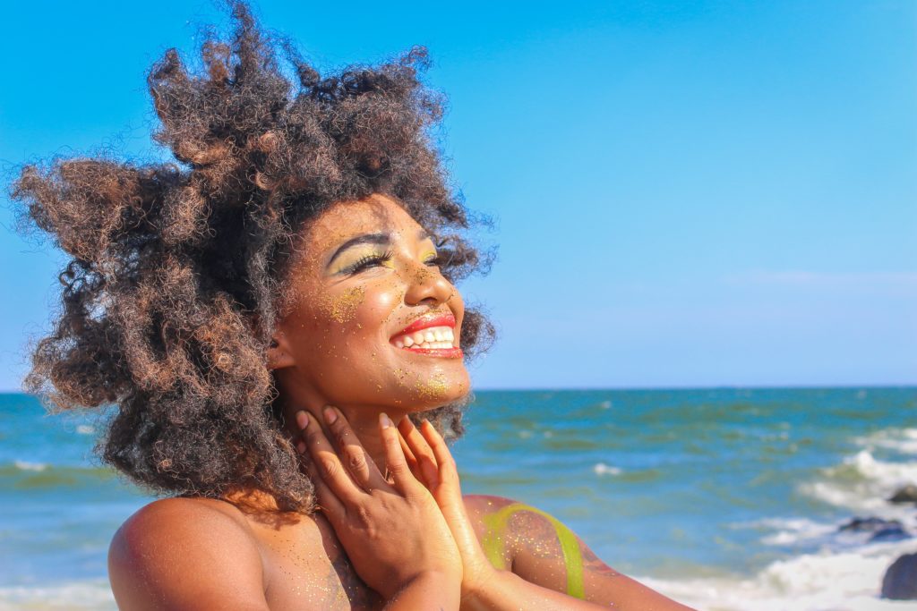 afro hair from the sun, beach and swimming pool